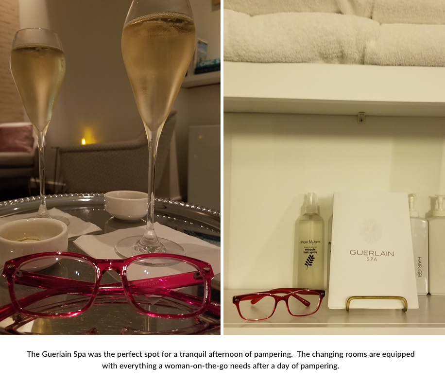 Two champagne glasses and red eyeglasses on a table. Guerlain Spa products displayed alongside eyeglasses.